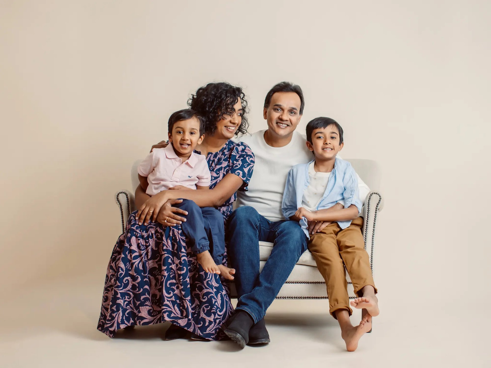 a studio photo of a family.